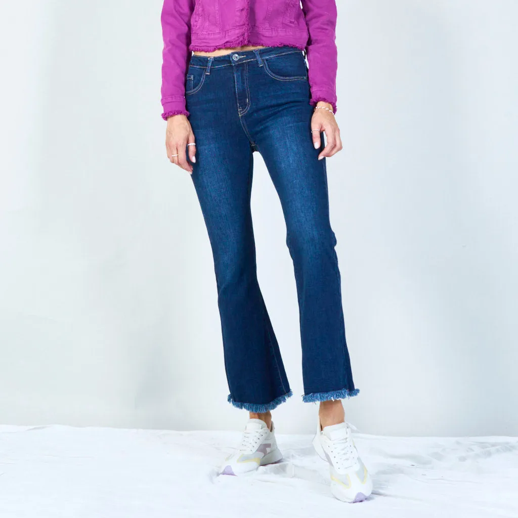 Trendy high-waisted flare jeans with frayed hem wholesale