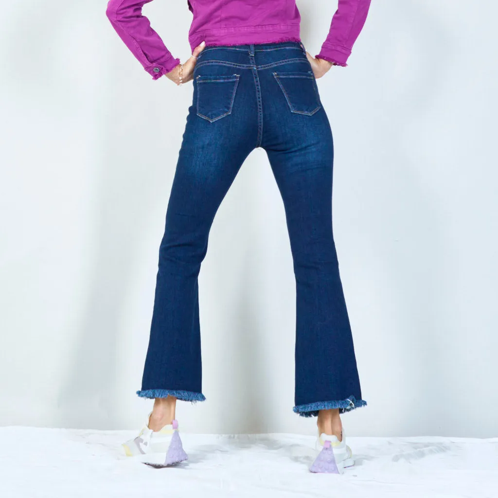 Trendy high-waisted flare jeans with frayed hem wholesale
