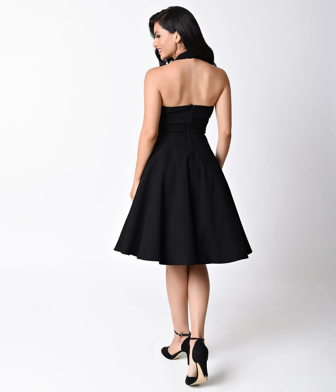 Unique Vintage 1950s Style Black Criss Cross Halter Flare Rita Dress