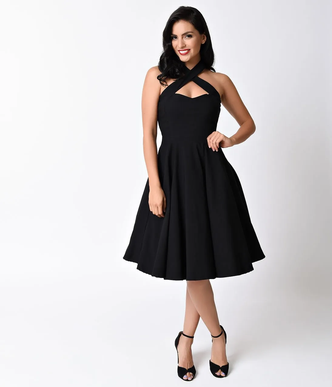 Unique Vintage 1950s Style Black Criss Cross Halter Flare Rita Dress